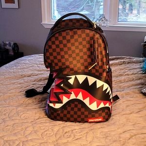 juice sprayground backpack